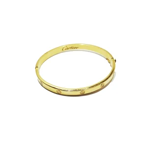 دستبند النگویی لاو کارتیر طلایی